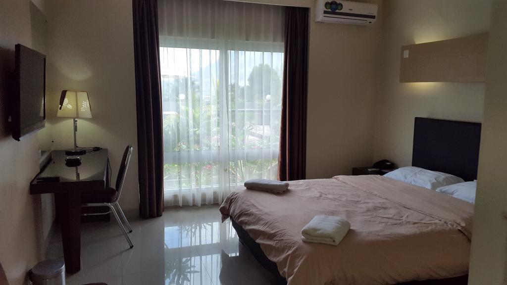 Jhoanie Hotel Tomohon Rom bilde